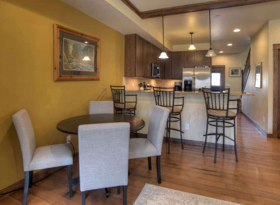 This stunning property boasts a beautifully designed kitchen with modern appliances and ample counter space, perfect for culinary enthusiasts.