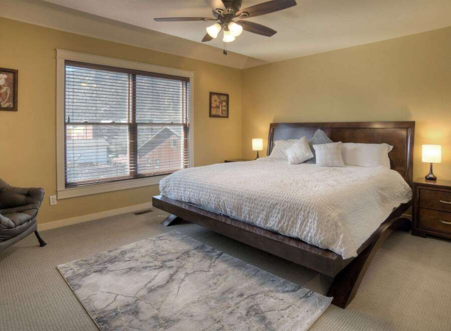 This stunning bedroom boasts a luxurious king-sized bed, perfect for a restful night's sleep.