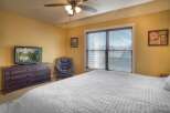 This inviting bedroom features a comfortable bed, perfect for relaxation.