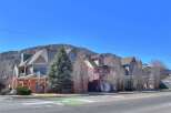 Discover charming multi-family homes nestled in a picturesque setting.