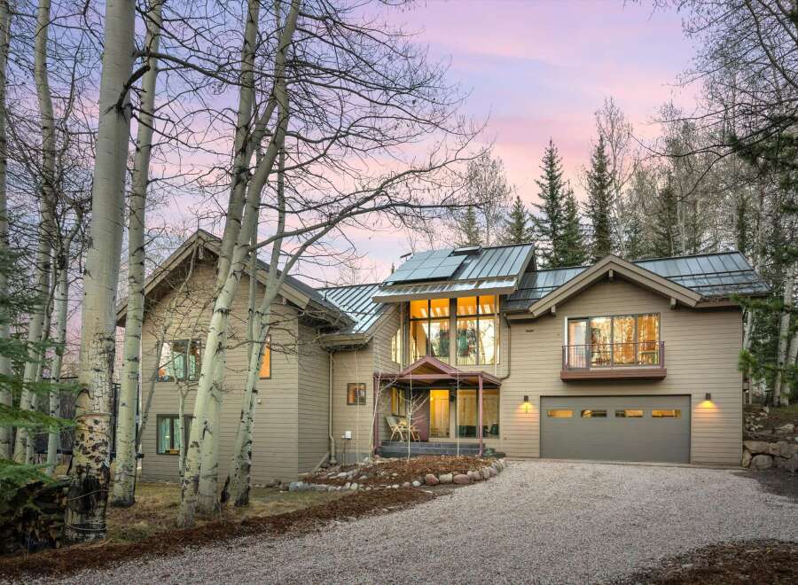 This stunning property boasts a modern design with a touch of rustic charm.