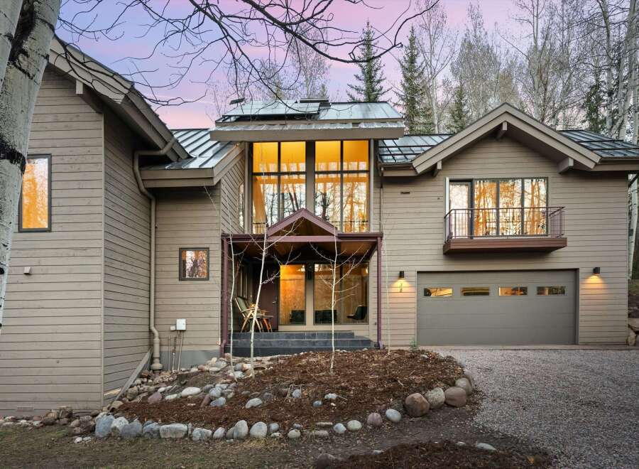 This stunning property boasts a modern design with a warm and inviting ambiance.