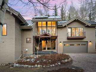 This stunning property boasts a modern design with a warm and inviting ambiance.