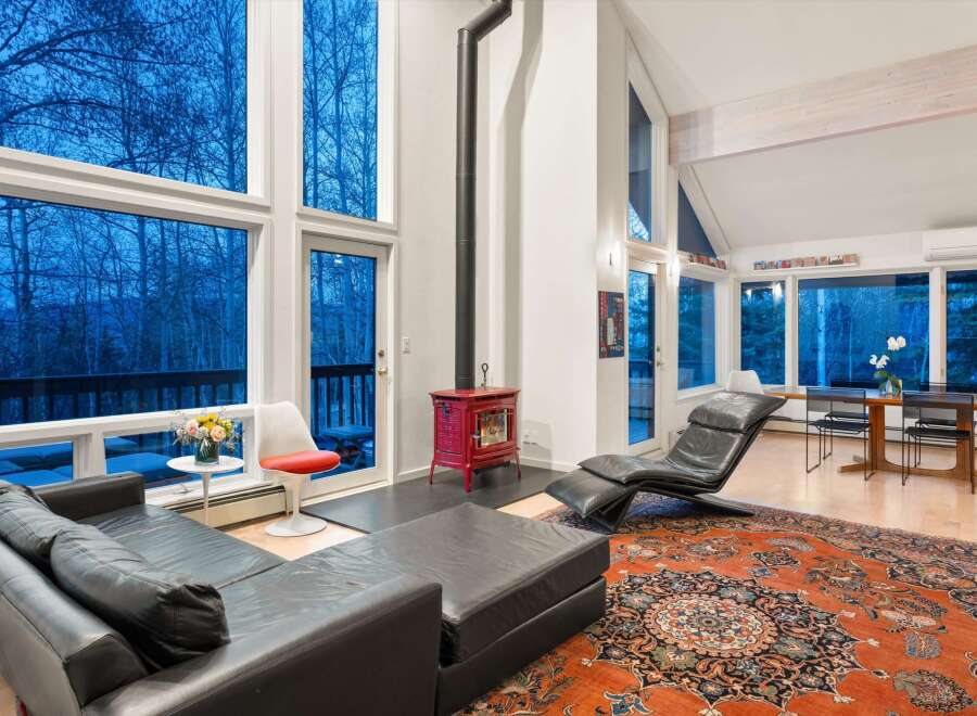 Step into a modern living space with stunning views.