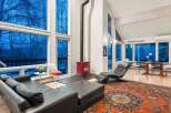 Step into a modern living space with stunning views.
