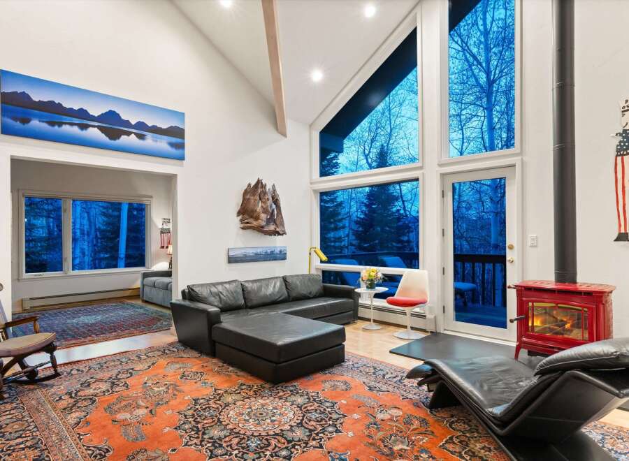 Experience the epitome of luxury living in this stunning property, boasting a spacious living area with soaring ceilings and expansive windows that frame breathtaking views.