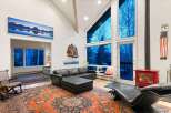 Experience the epitome of luxury living in this stunning property, boasting a spacious living area with soaring ceilings and expansive windows that frame breathtaking views.