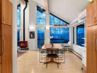 This stunning property boasts a modern interior with an open floor plan, perfect for entertaining.