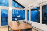This stunning property boasts a bright and airy dining area, perfect for entertaining or enjoying a quiet meal.