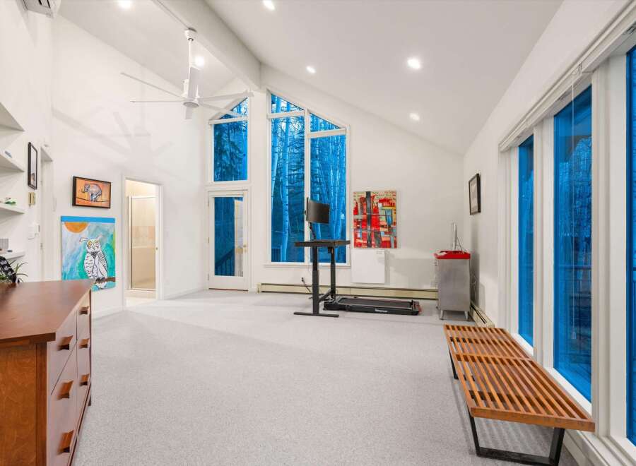This stunning property boasts a bright and airy interior with high ceilings and large windows that flood the space with natural light.
