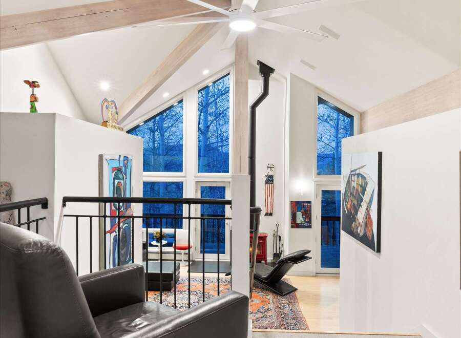 Step into luxury with this stunning property featuring a modern interior and high ceilings.