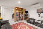 Discover a versatile living space with this property, perfect for both relaxation and fitness.