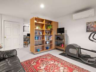 Discover a versatile living space with this property, perfect for both relaxation and fitness.