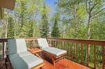 Enjoy the serene mountain views from this charming deck, perfect for relaxing or entertaining.