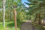 Discover the natural beauty surrounding this property with a well-maintained trail perfect for outdoor adventures.