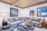 This cozy living room features a comfortable sofa, perfect for relaxing after a long day.