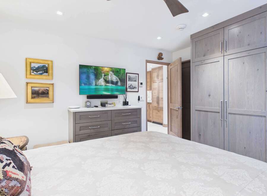 This luxurious bedroom boasts a modern design with a touch of elegance.