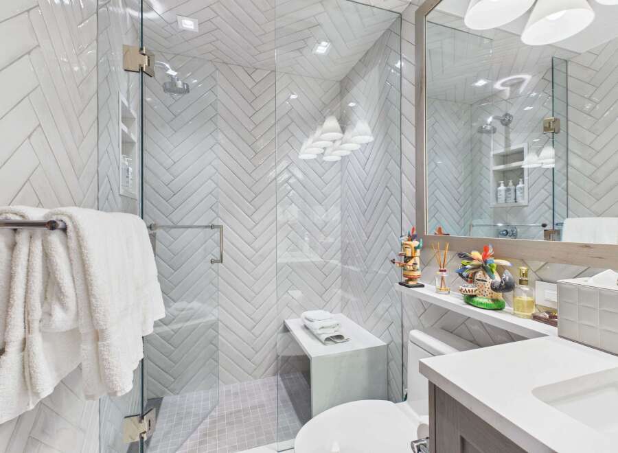 Step into luxury with this stunning bathroom featuring a modern design and high-end finishes.