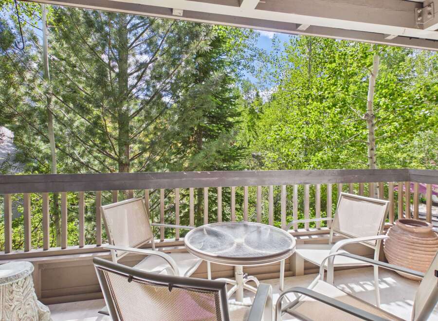 Enjoy the serene mountain views from this charming balcony, perfect for your morning coffee or evening relaxation.