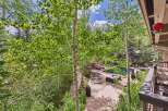 Experience luxury mountain living with this stunning property featuring a private pool and lounge area, perfect for relaxation and entertaining.
