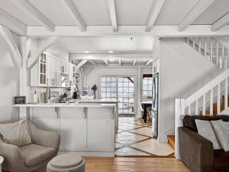 Step into this stunning home featuring a bright and airy open-concept design.
