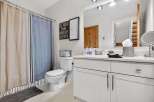 Step into a beautifully designed bathroom that exudes comfort and style.