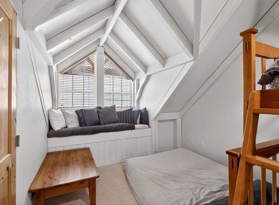 Discover the charm of this unique property featuring a cozy attic bedroom.