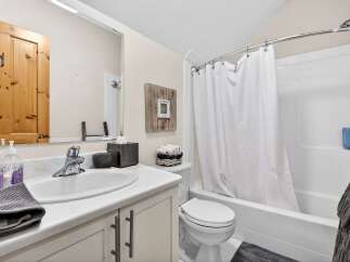 Step into a bright and inviting bathroom, perfect for relaxation.