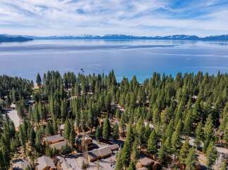 Discover the tranquility of lakeside living in this stunning property.