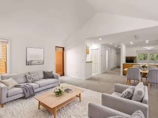 Step into this inviting living space, perfect for relaxation and entertaining.