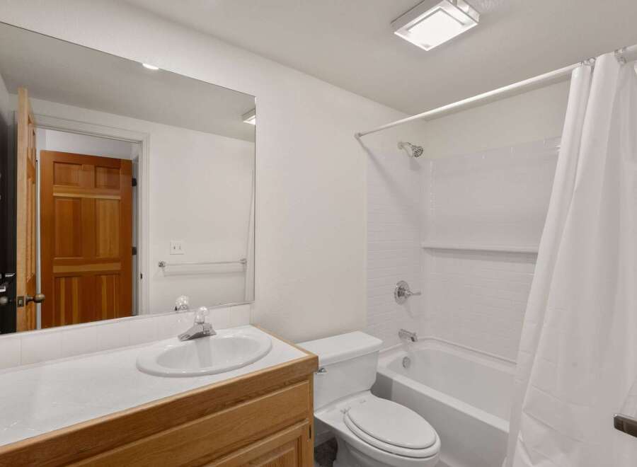 Step into this inviting bathroom, featuring a clean and bright design.
