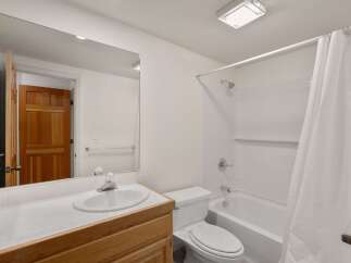 Step into this inviting bathroom, featuring a clean and bright design.