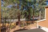 Enjoy the tranquility of this property, surrounded by lush trees and a serene outdoor space.