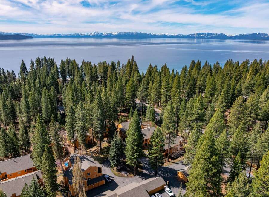 Nestled amidst a lush forest, this property offers a serene escape with stunning views.