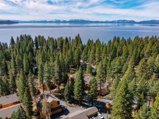 Nestled amidst a lush forest, this property offers a serene escape with stunning views.