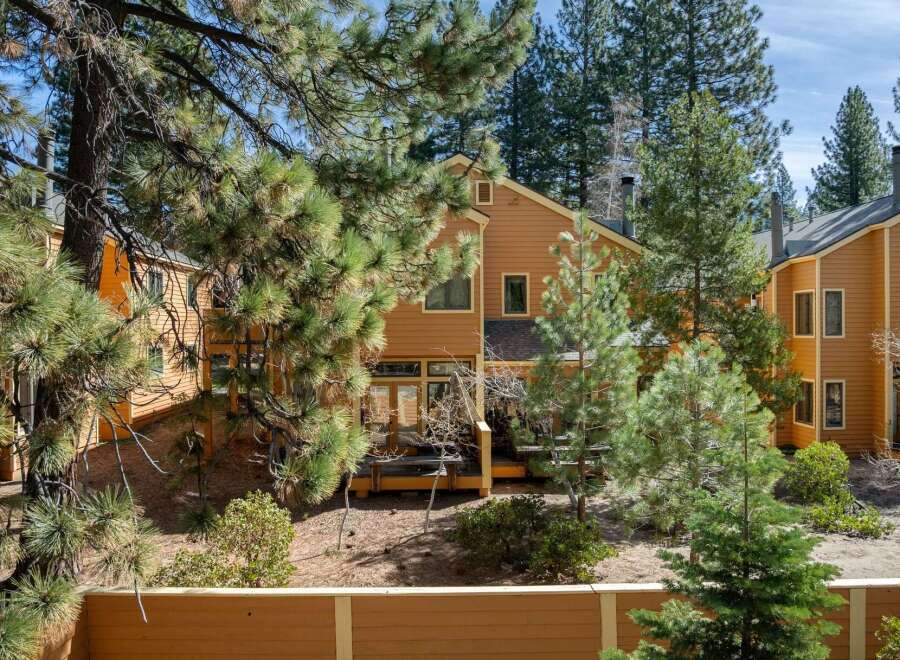 Nestled amidst lush greenery, this charming property offers a serene escape.