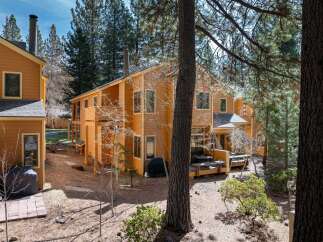 Discover a charming property nestled in a serene, wooded setting.