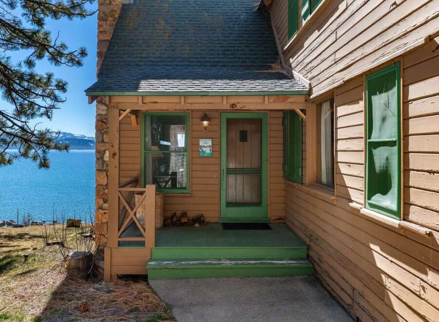 Nestled on the serene lakeside, this charming property offers a perfect blend of rustic charm and natural beauty.