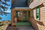 Nestled on the serene lakeside, this charming property offers a perfect blend of rustic charm and natural beauty.