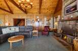 Step into a cozy living space with a rustic charm.
