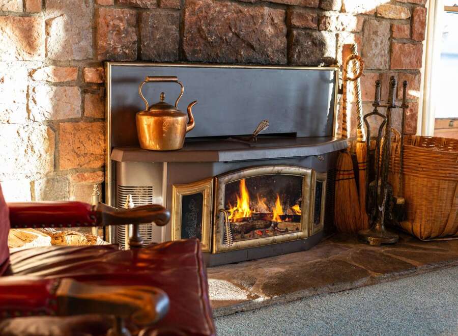 Cozy up in front of this inviting fireplace, a perfect centerpiece for relaxing evenings.