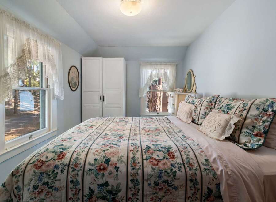 Step into a charming bedroom retreat, perfect for relaxation and comfort.