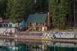Discover your dream lakeside retreat! This charming property boasts a stunning waterfront location, perfect for enjoying serene views and outdoor activities.