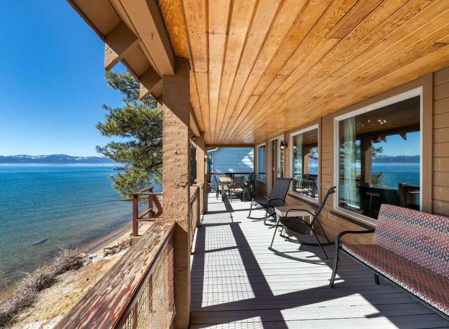 Enjoy breathtaking lake views from this stunning property! This home features a spacious deck, perfect for relaxing and entertaining.