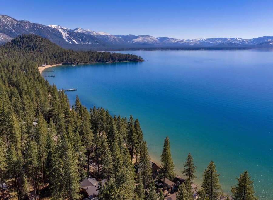 Discover your dream home with breathtaking lake views and stunning mountain backdrops.