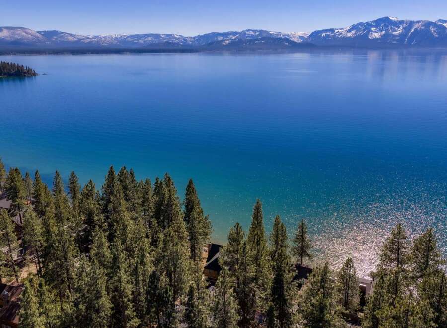 Experience the tranquility of lakeside living with this stunning property.