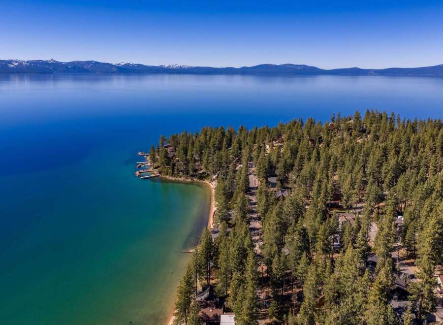 Discover the tranquility of lakeside living with this stunning property.