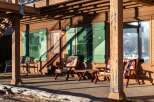 Charming rustic porch with inviting seating.