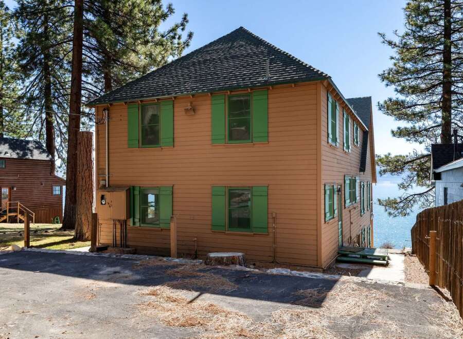 This charming two-story home boasts a classic design with a warm, inviting exterior.