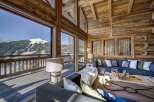 Experience the ultimate in luxury living with this stunning chalet boasting breathtaking mountain views.
